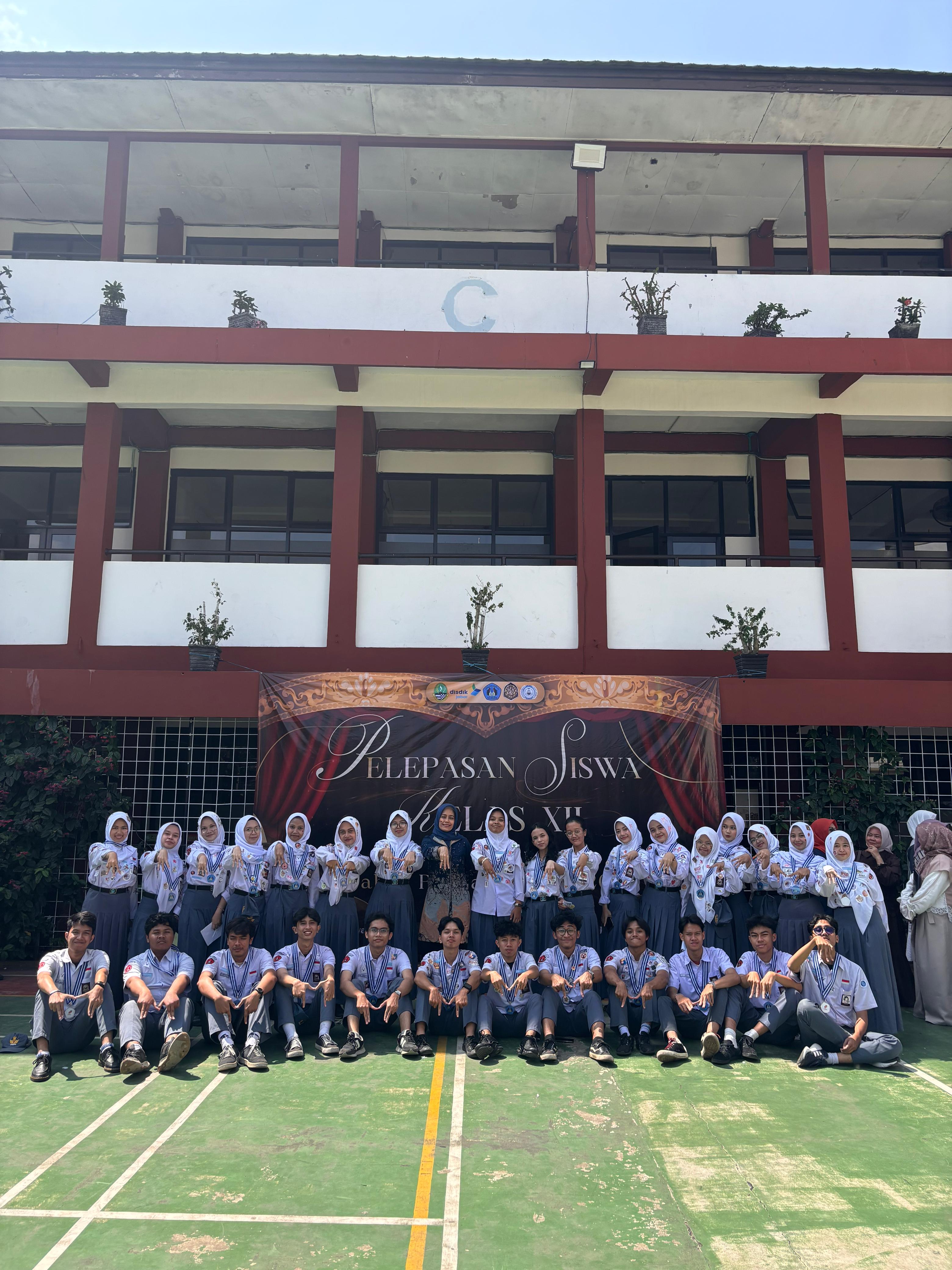 Foto kelas — suatu hari yang tak akan terulang
